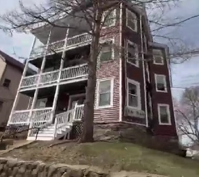 house after having vinyl siding installed all around and deck repaired and repainted
